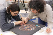 Archaeologist Hala Alarashi and conservator-restorers Alice Costes and Andrea Fischer meticulously assembled the individual beads of this ancient necklace at the State Academy for Fine Arts Stuttgart.