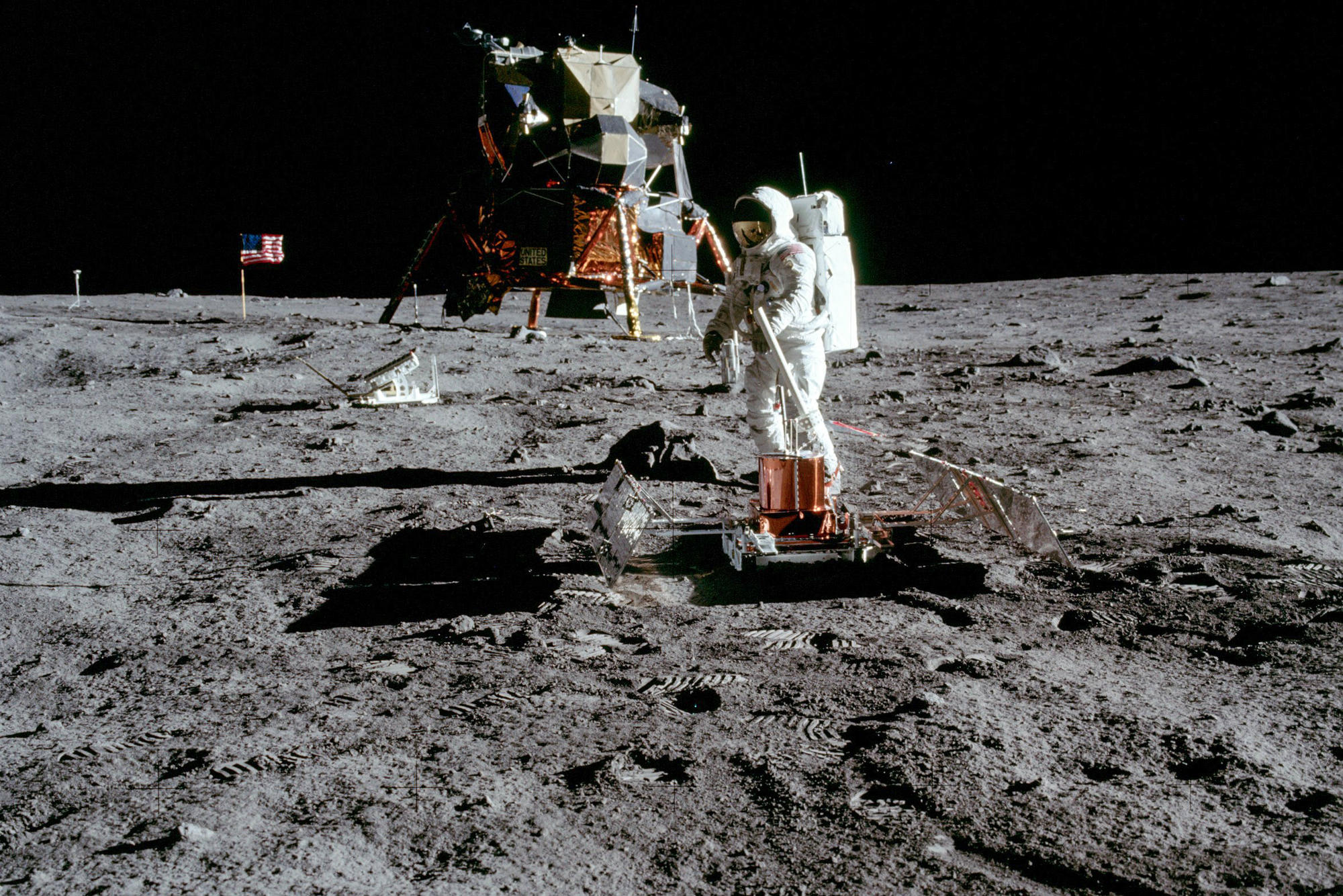 Man on the moon: Astronaut Buzz Aldrin set up a laser reflector and a seismometer on the surface of the moon. The lunar module and the American flag are seen in the background. The picture was taken during the Apollo 11 mission in 1969.