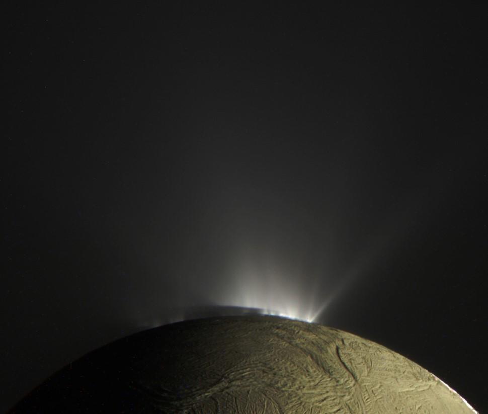 Saturn's moon Enceladus with plume.