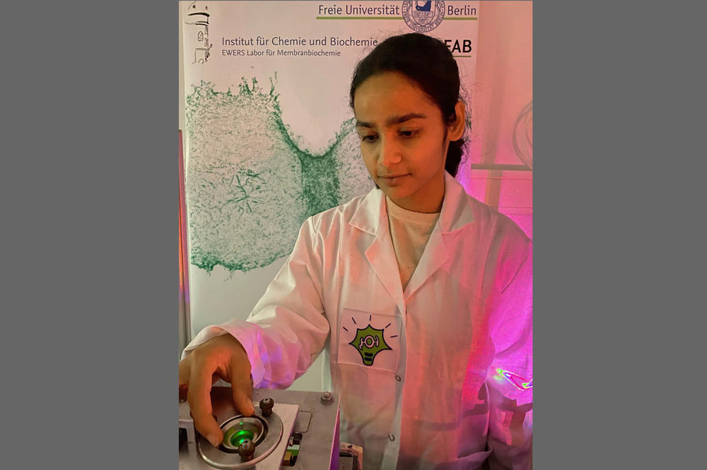 Cell biologist Dr. Purba Kashyap uses a pulse of light to release protein molecules within a cell.