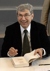 2007 – After the ceremony awarding Orhan Pamuk an honorary doctorate, he autographs copies of his books for members of the audience.