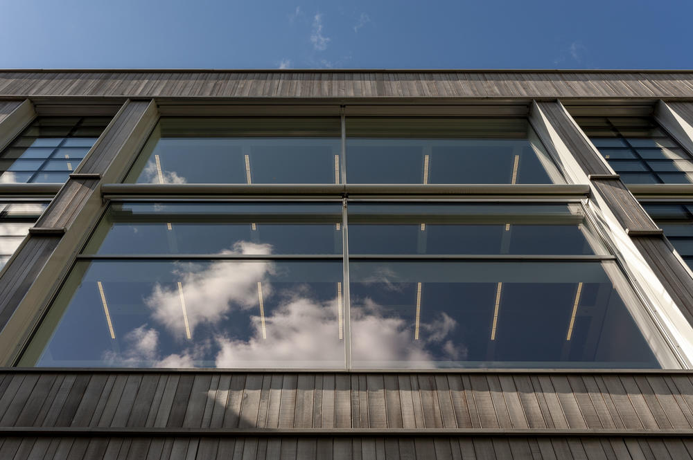 Clouds reflected on the windows of the Holzlaube building