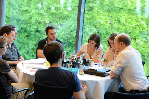 Junior faculty members met for discussions at the Round Table Forum on June 20, 2013.